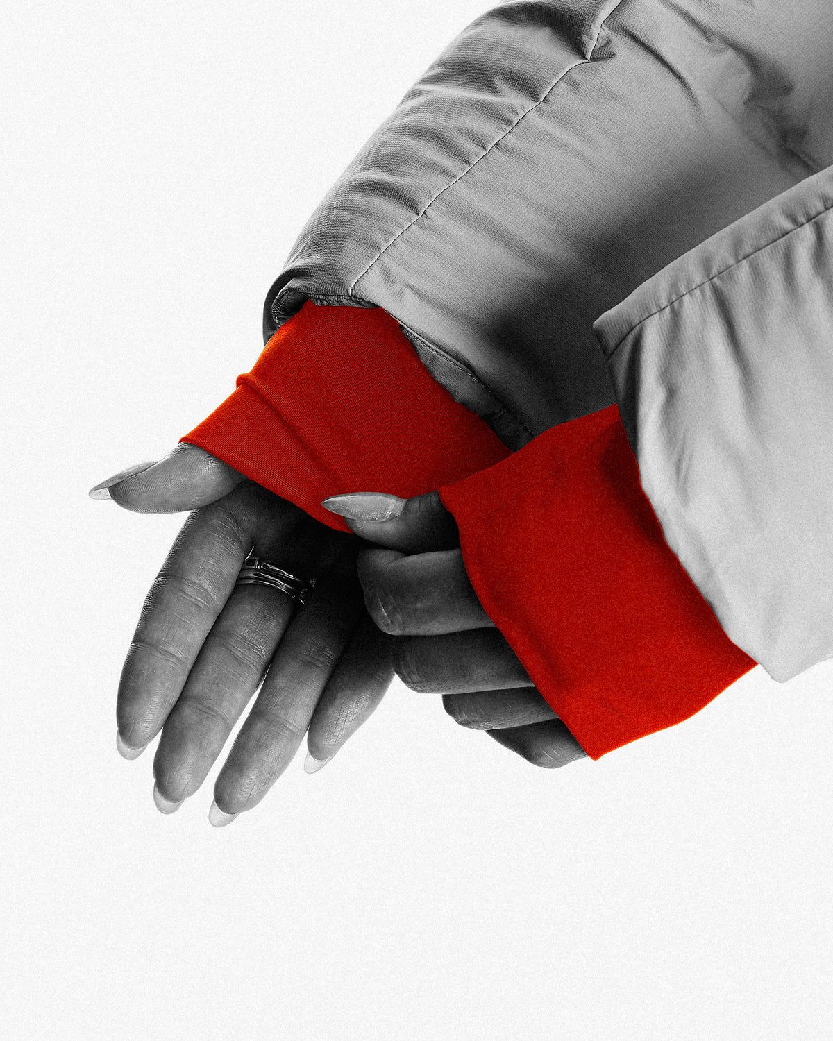 Integrated hand gaiters for added warmth and protection